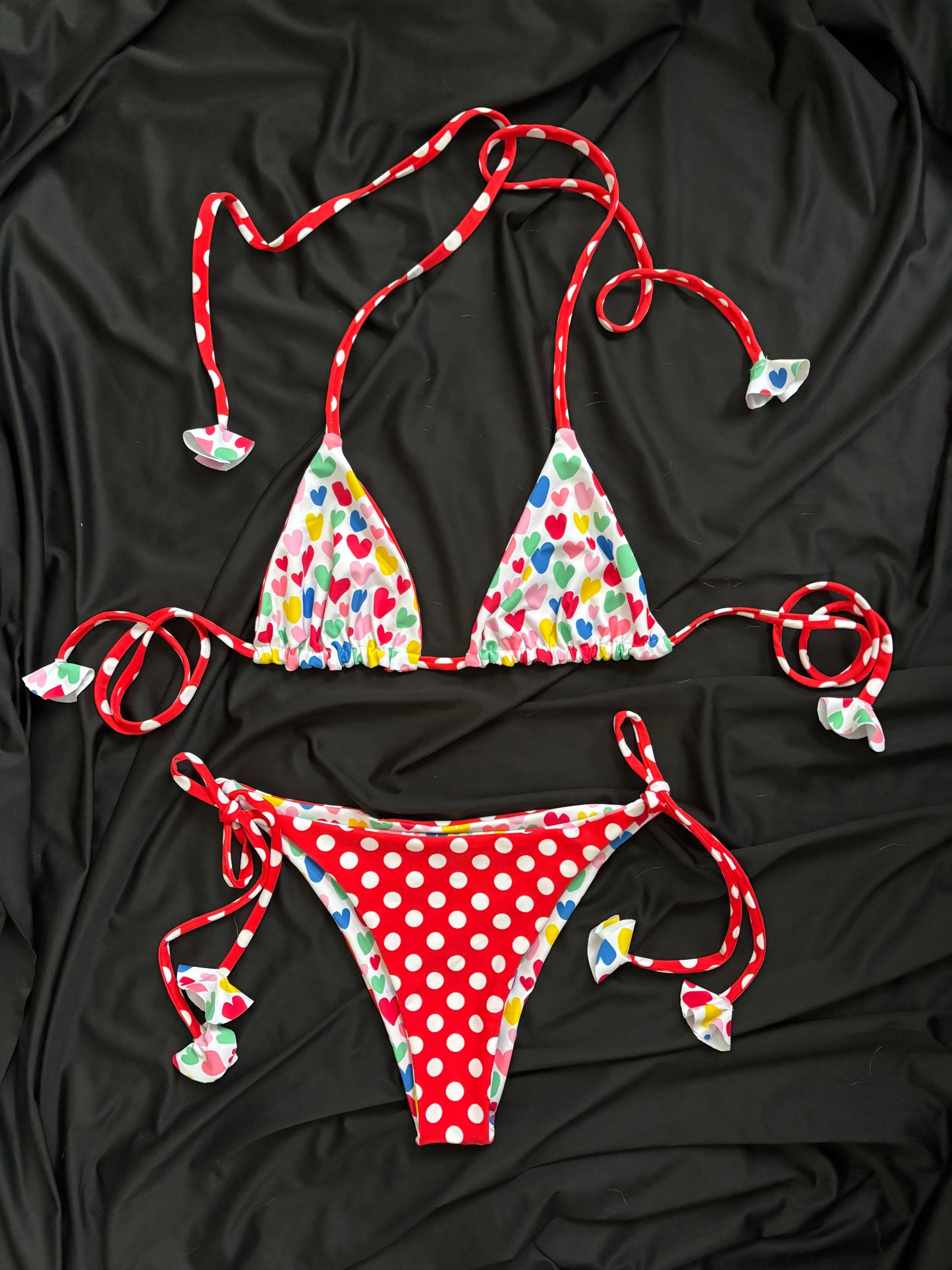 Red/white polka dots reverse to heart print